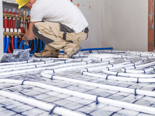 Electric underfloor heating being installed